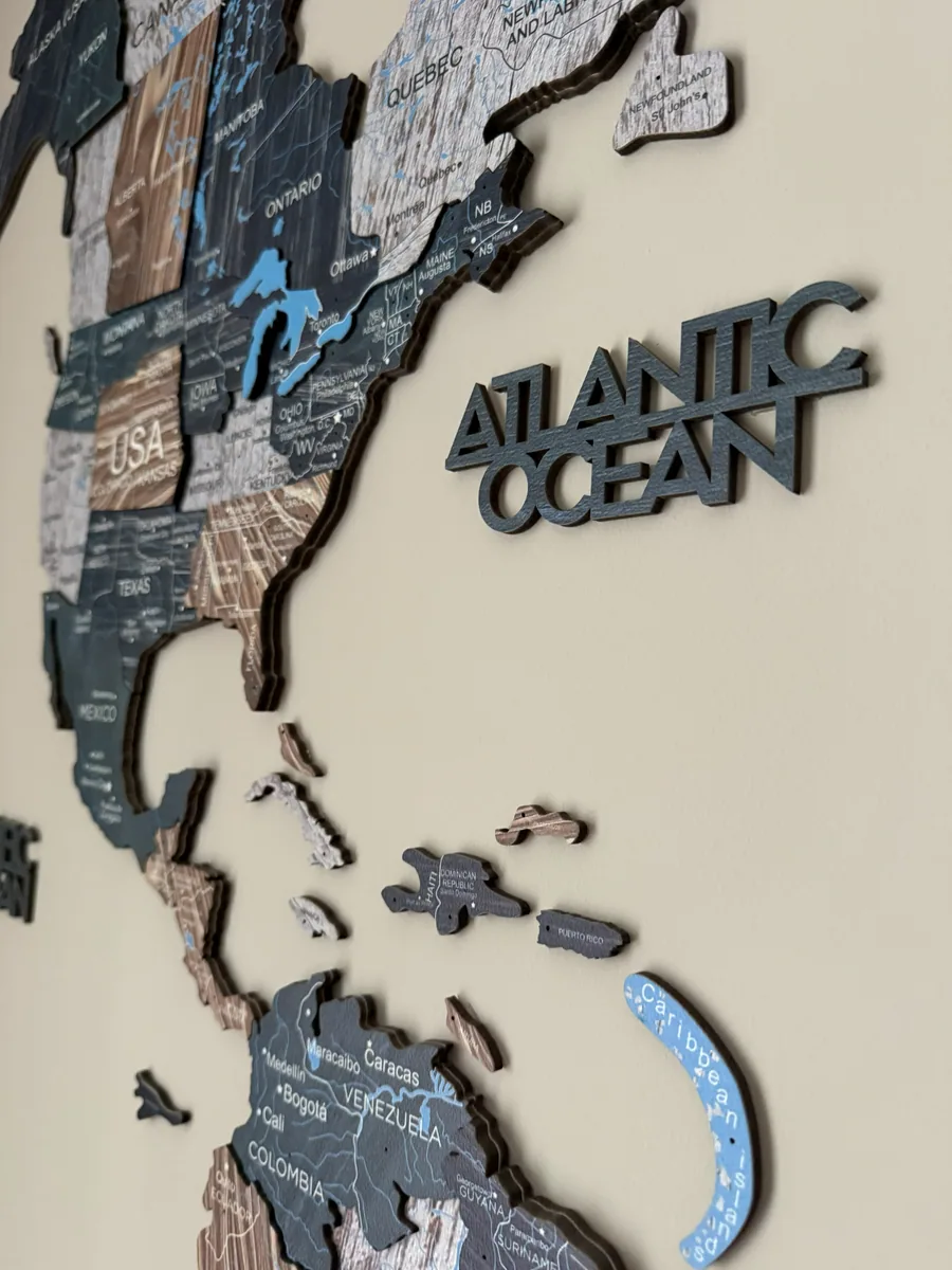Close-up of Enjoy The Wood map pieces showing wall depth